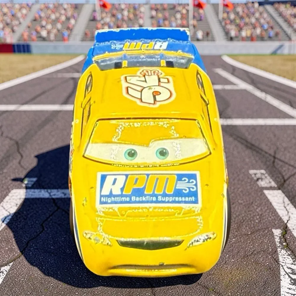 Disney Pixar Cars Winford Bradford Rutherford Yellow Die Cast Race Car A71